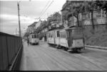 Kurse der Compagnie des Tramways de Neuchâtel (TN) mit Triebwagen Be 2/2 65'' und Anhänger B2 102 mit Triebwagen Be 2/2 66 in Neuchâtel