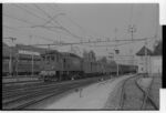SGEG DH A SWN135 1007-26: Reisezug der Schweizerischen Bundesbahnen mit Lokomotive Ae 3/6 II 10452 in Aarau