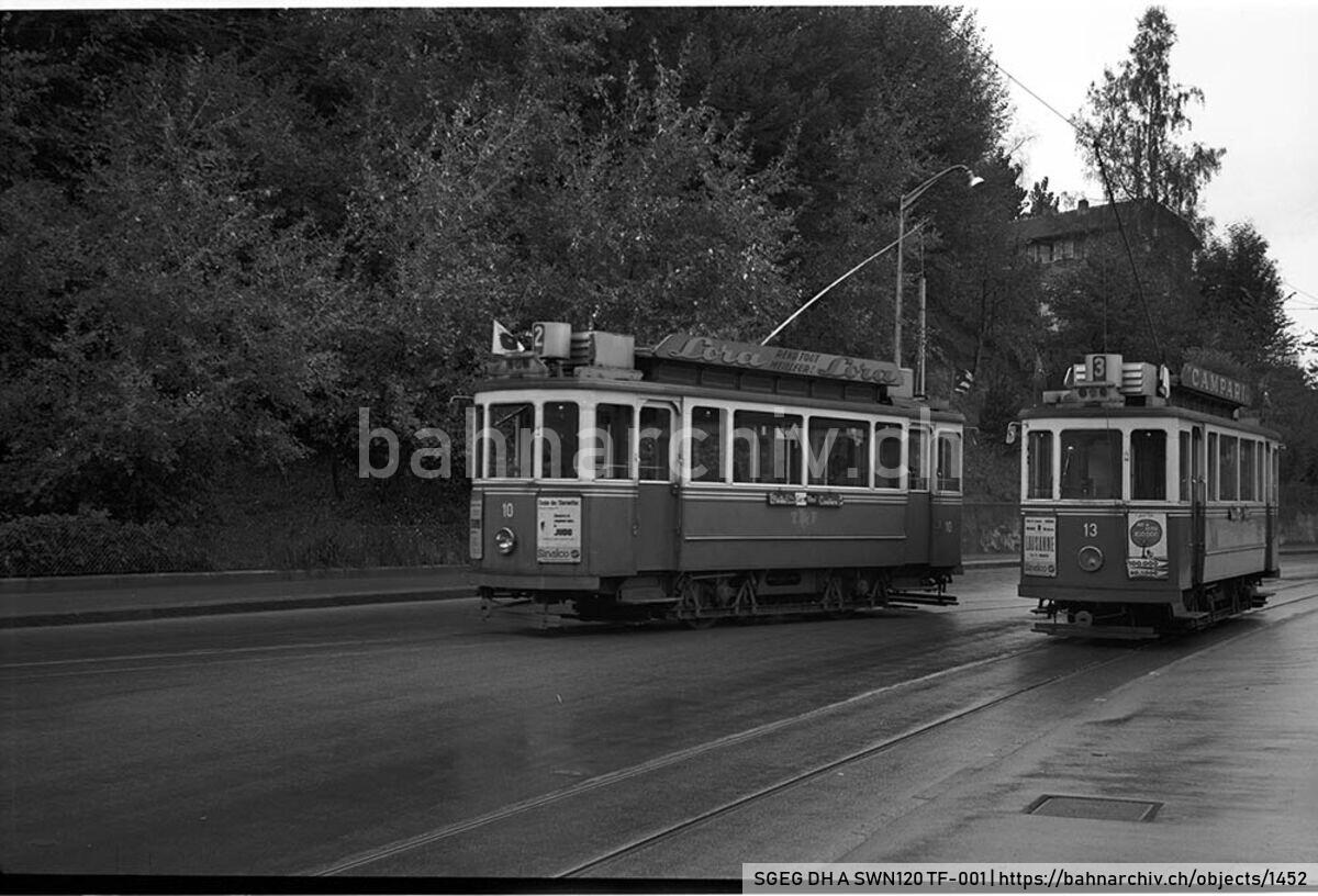 SGEG DH A SWN120 TF-001: Triebwagen Be 2/2 10 und Be 2/2 13 der Société des tramways de Fribourg (TF) in Fribourg