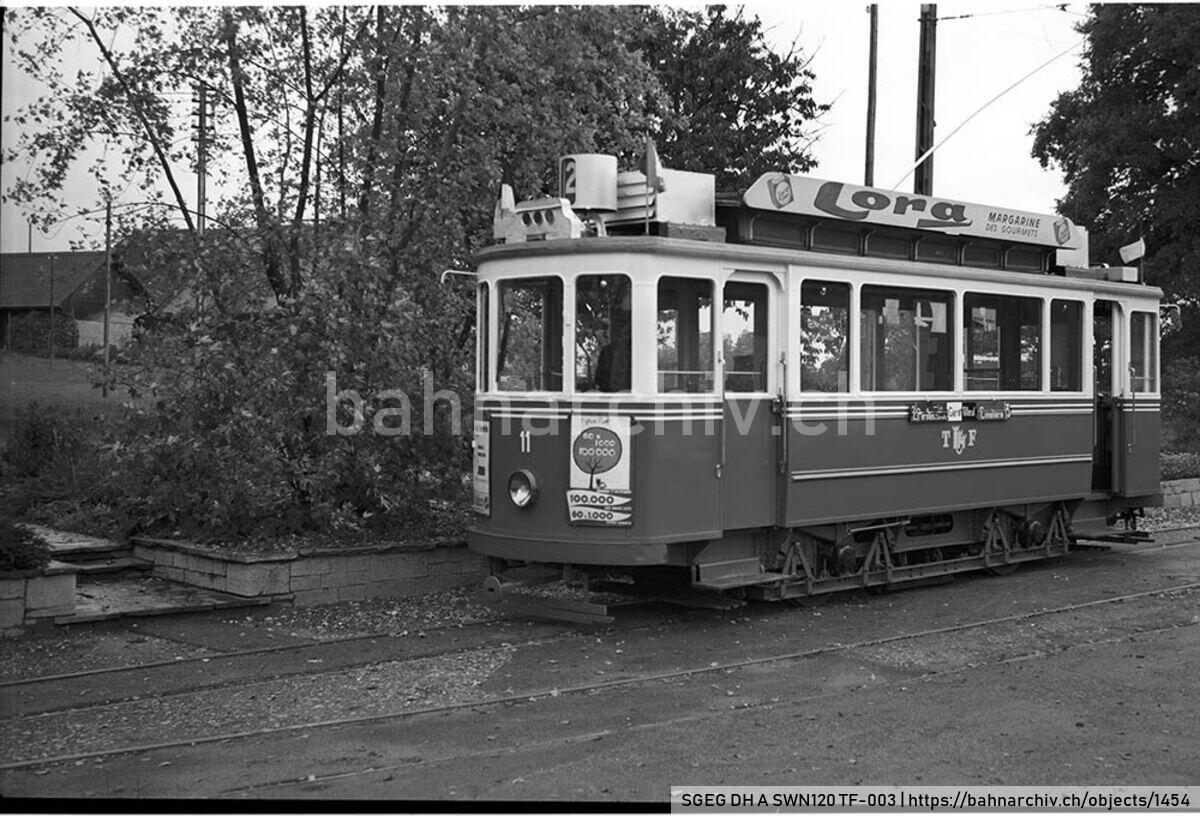 SGEG DH A SWN120 TF-003: Triebwagen Be 2/2 11 der Société des tramways de Fribourg (TF) in Fribourg.