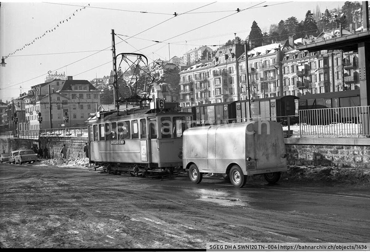 SGEG DH A SWN120 TN-004: Triebwagen Be 2/2 33 der Compagnie des Tramways de Neuchâtel (TN) mit Postanhänger in Neuchâtel
