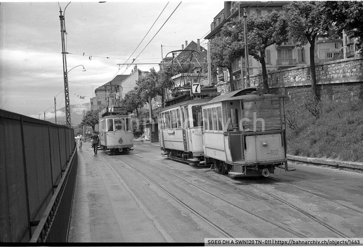 SGEG DH A SWN120 TN-011: Kurse der Compagnie des Tramways de Neuchâtel (TN) mit Triebwagen Be 2/2 65'' und Anhänger B2 102 mit Triebwagen Be 2/2 66 in Neuchâtel