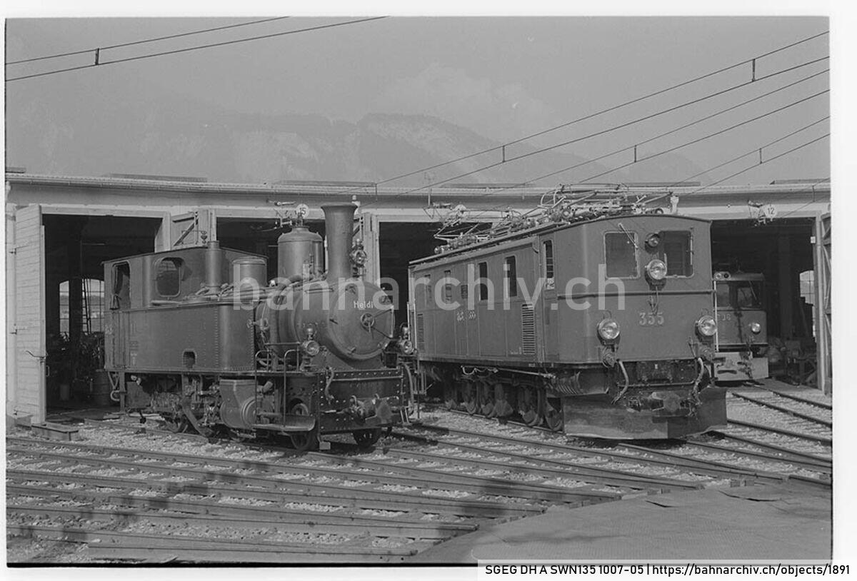 SGEG DH A SWN135 1007-05: Die Lokomotiven G 3/4 11 "Heidi" und Ge 4/6 355 der Rhätischen Bahn (RhB) in Igis
